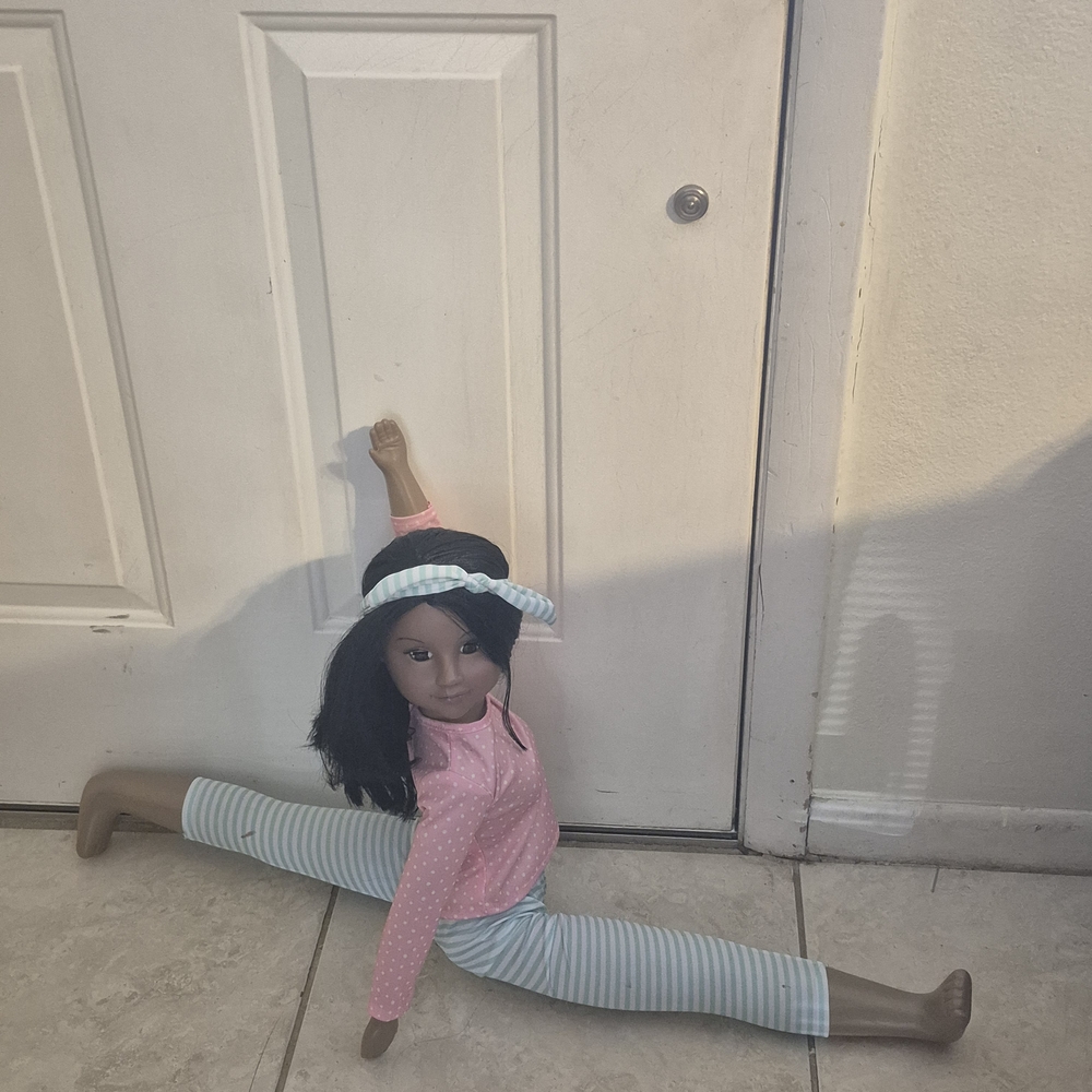 Rare Kawaii doll with black hair and a tan body